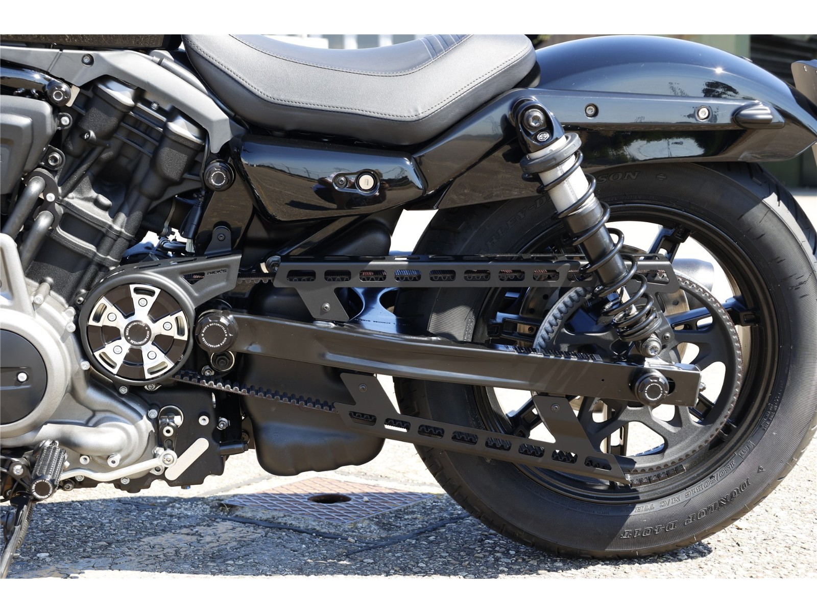Rick's Motorcycles Nightster axle cover swingarm axle design