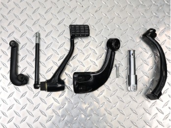 Soporte para reposapiés Iron / Roadster OEM 50600024