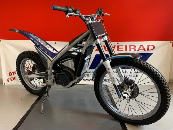em 1